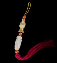 Two Jade Pendants Length of larger 1 3/4 inches.