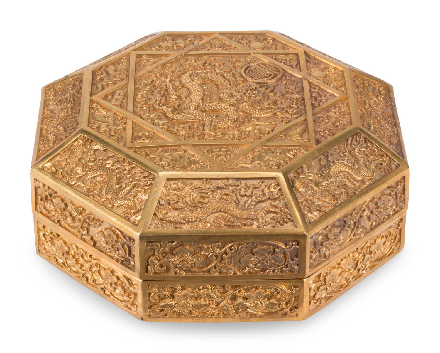 A Chinese Gilt Bronze Octagonal Box and Cover