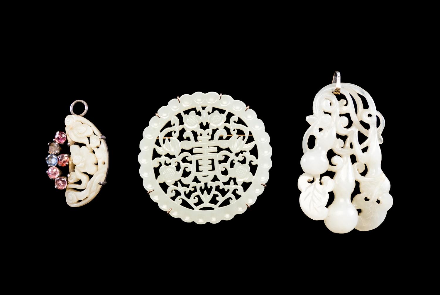 Three Reticulated Jade Pendants