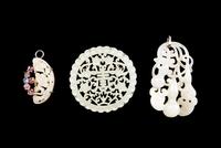 Three Reticulated Jade Pendants