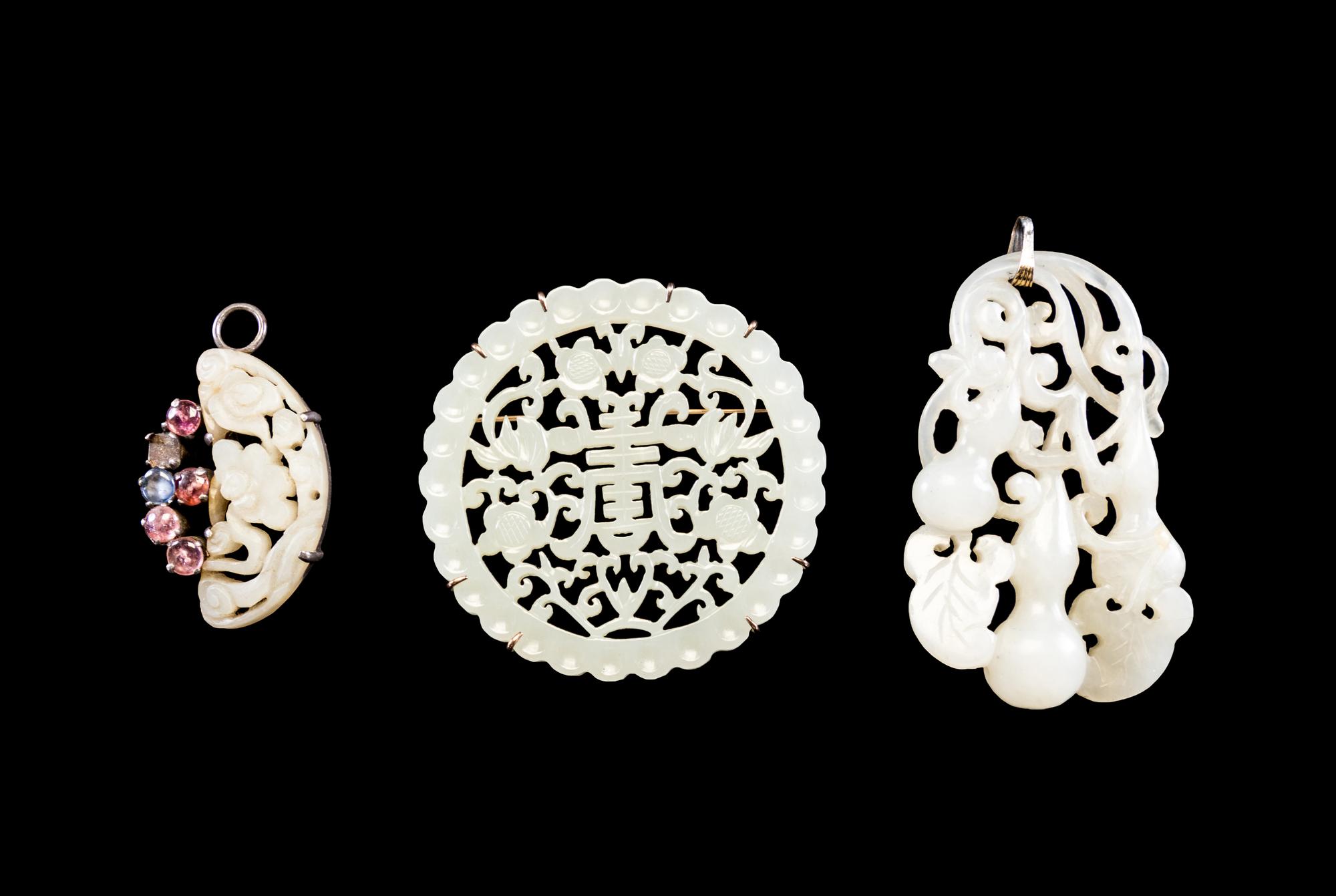 Three Reticulated Jade Pendants