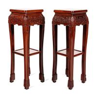 A Pair of Chinese Carved Hardwood Pedestals