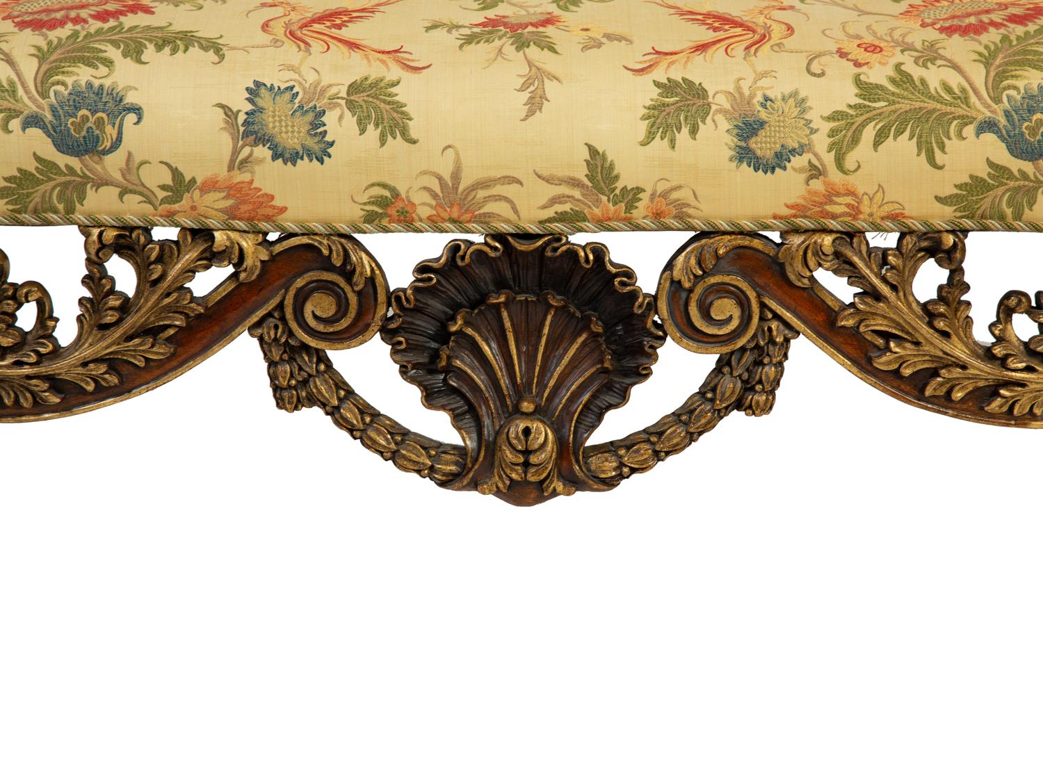 A Portuguese Carved Oak and Parcel Gilt Settee — 20TH CENTURY