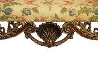 A Portuguese Carved Oak and Parcel Gilt Settee — 20TH CENTURY