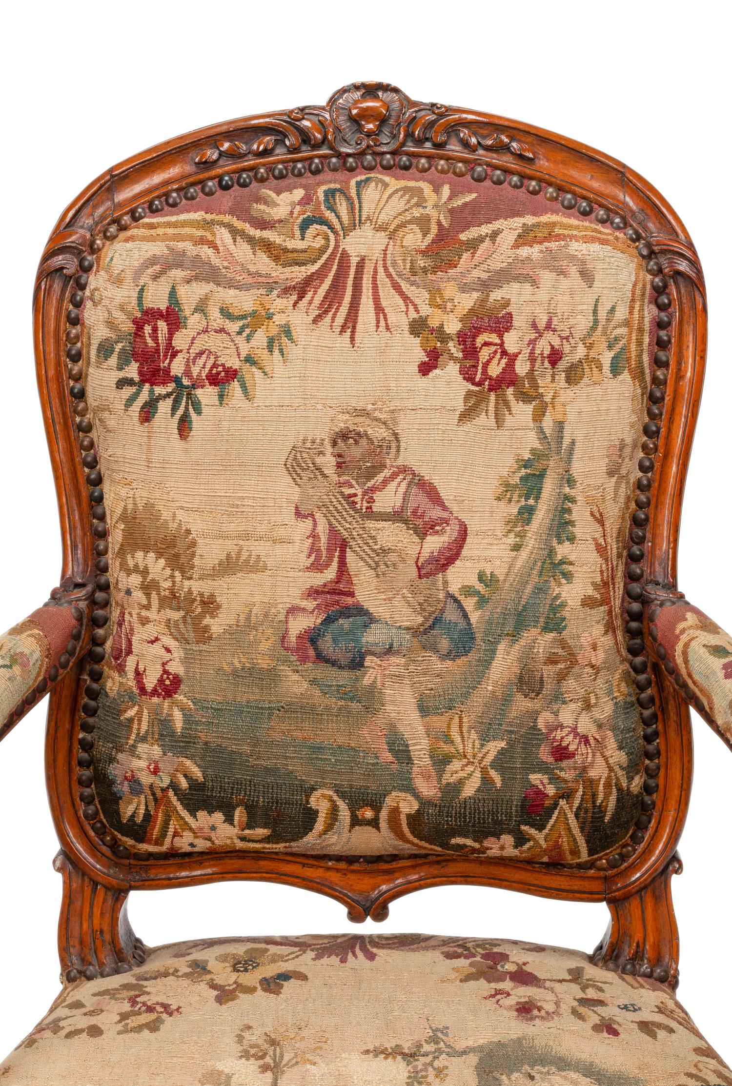 A Set of Four Louis XV Beechwood Fauteuils