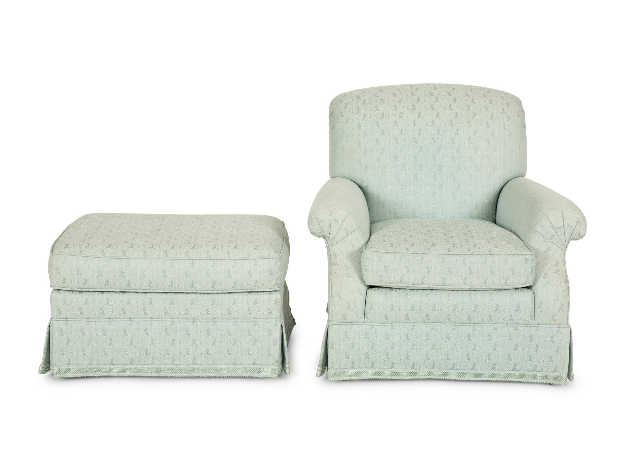 A Pale Blue Upholstered Club Chair with Matching Ottoman