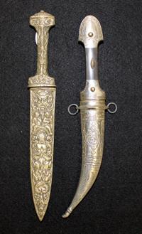 Two Middle Eastern Daggers Length of longer 10 3/4 inches. — FIRST HALF 20TH CENTURY