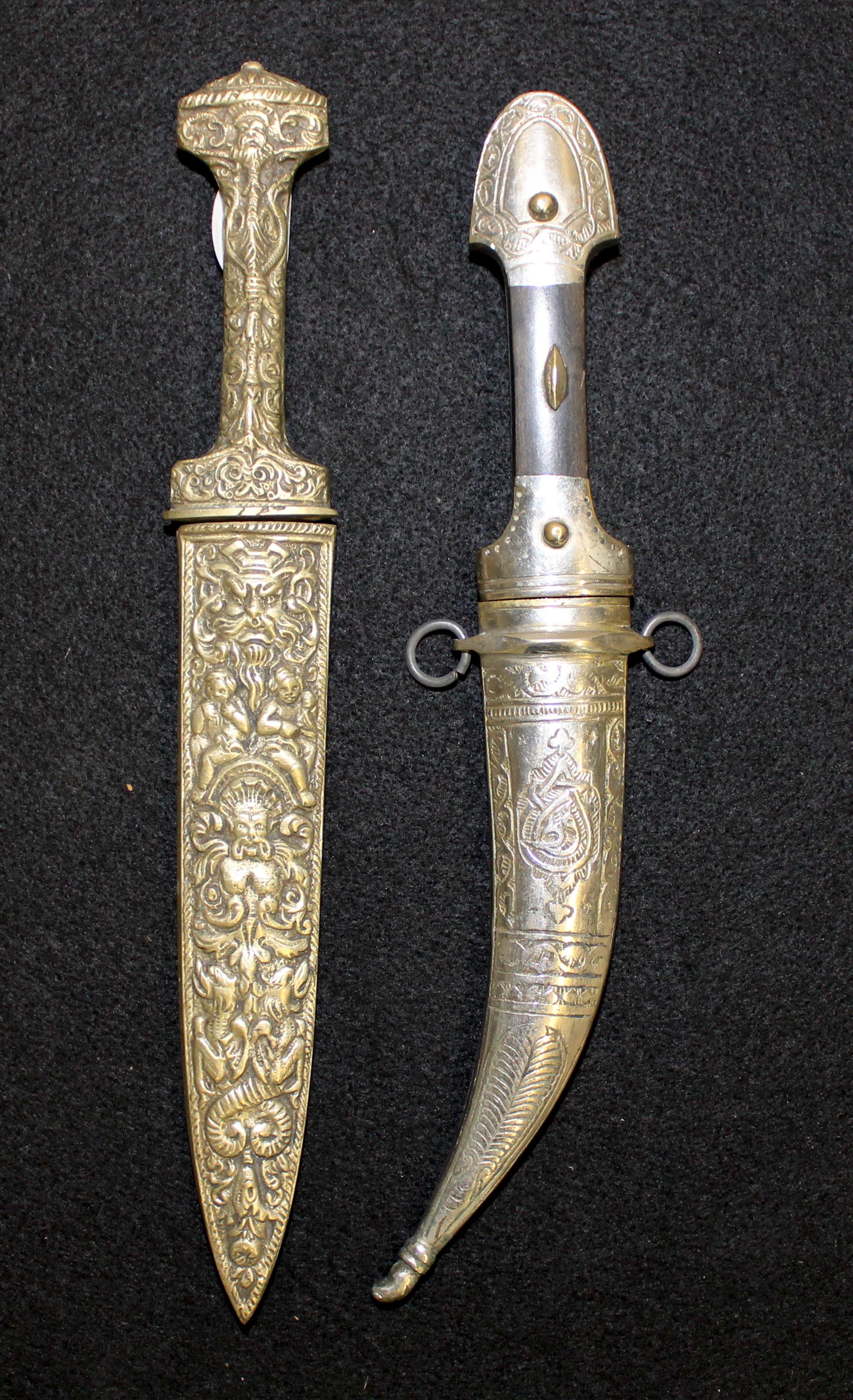 Two Middle Eastern Daggers Length of longer 10 3/4 inches. — FIRST HALF 20TH CENTURY