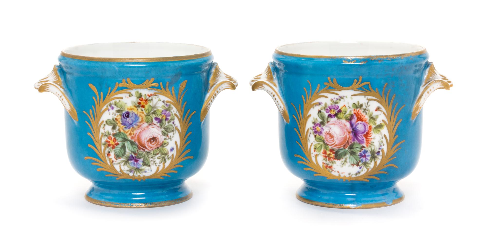 A Pair of Sevres Style Porcelain Cache Pots Height 4 1/2 inches.