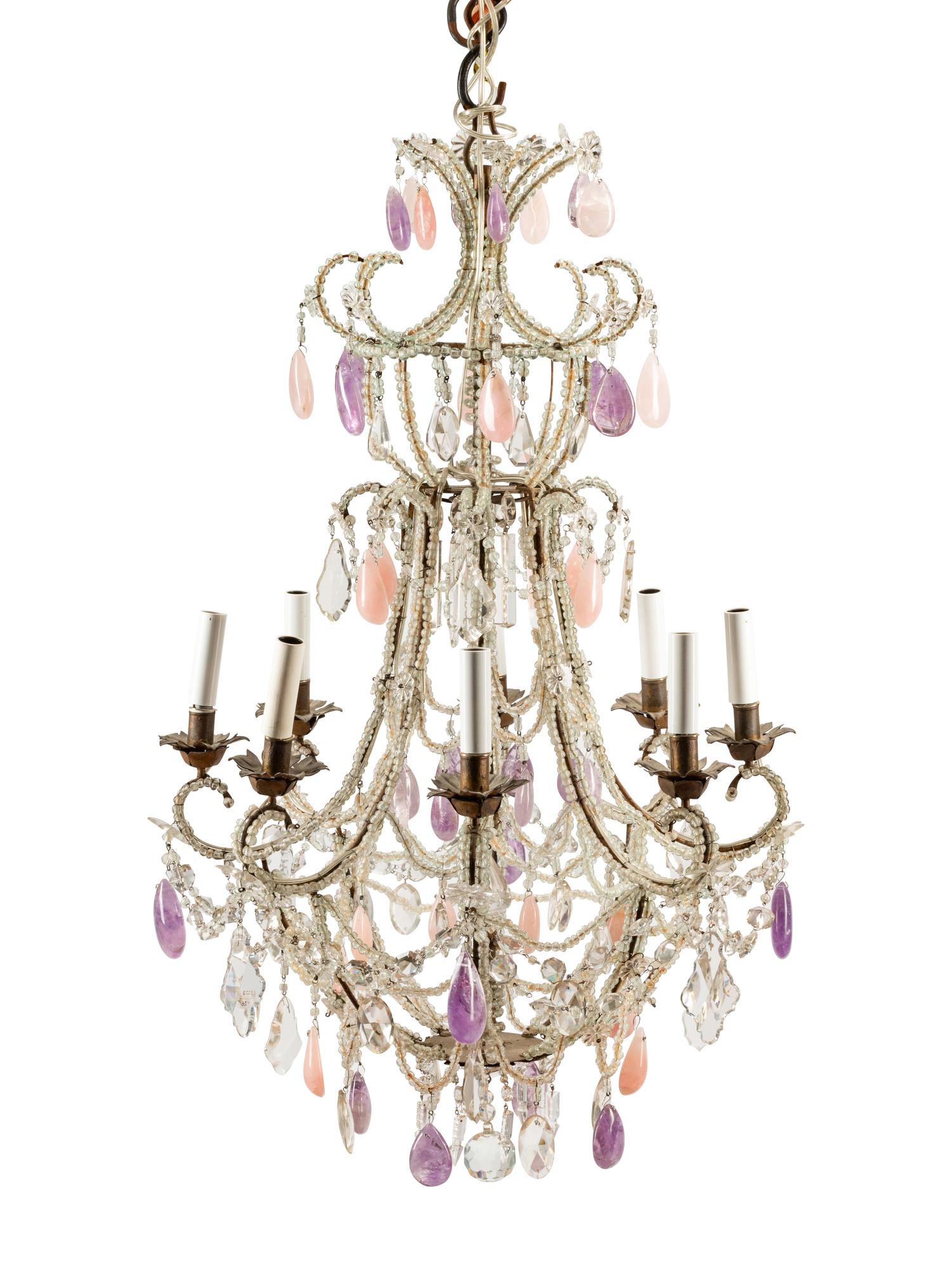 An Italian Bronze, Tôle, Rock Crystal, Amethyst and Rose Quartz Eight-Light Chandelier