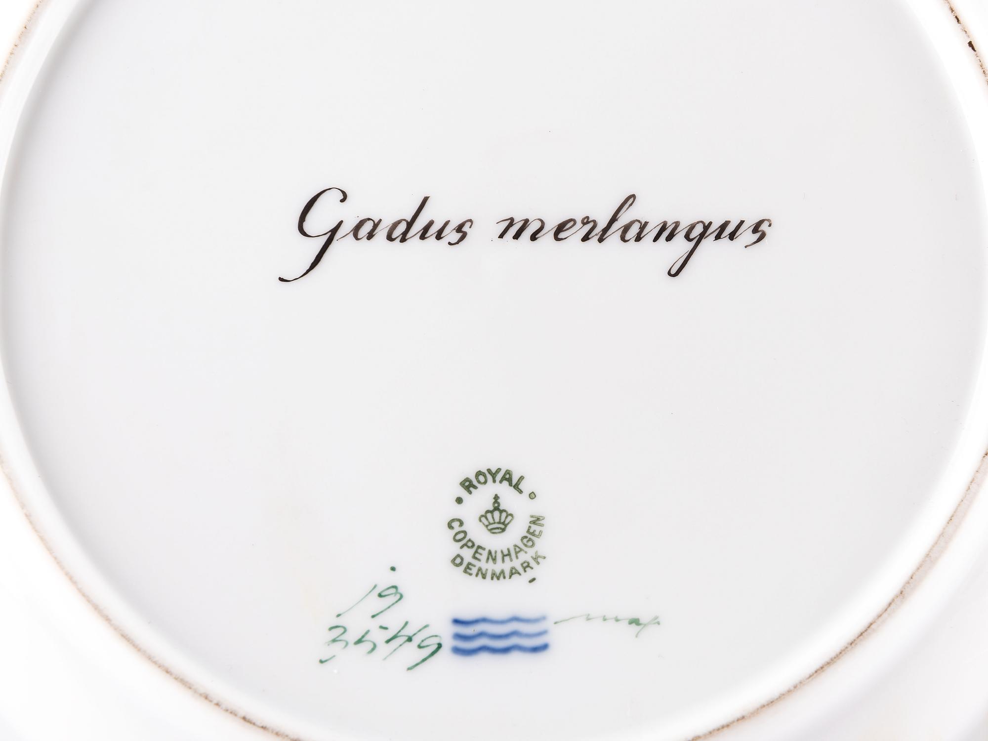 A Set of Twelve Royal Copenhagen Parcel Gilt Porcelain Fish Plates