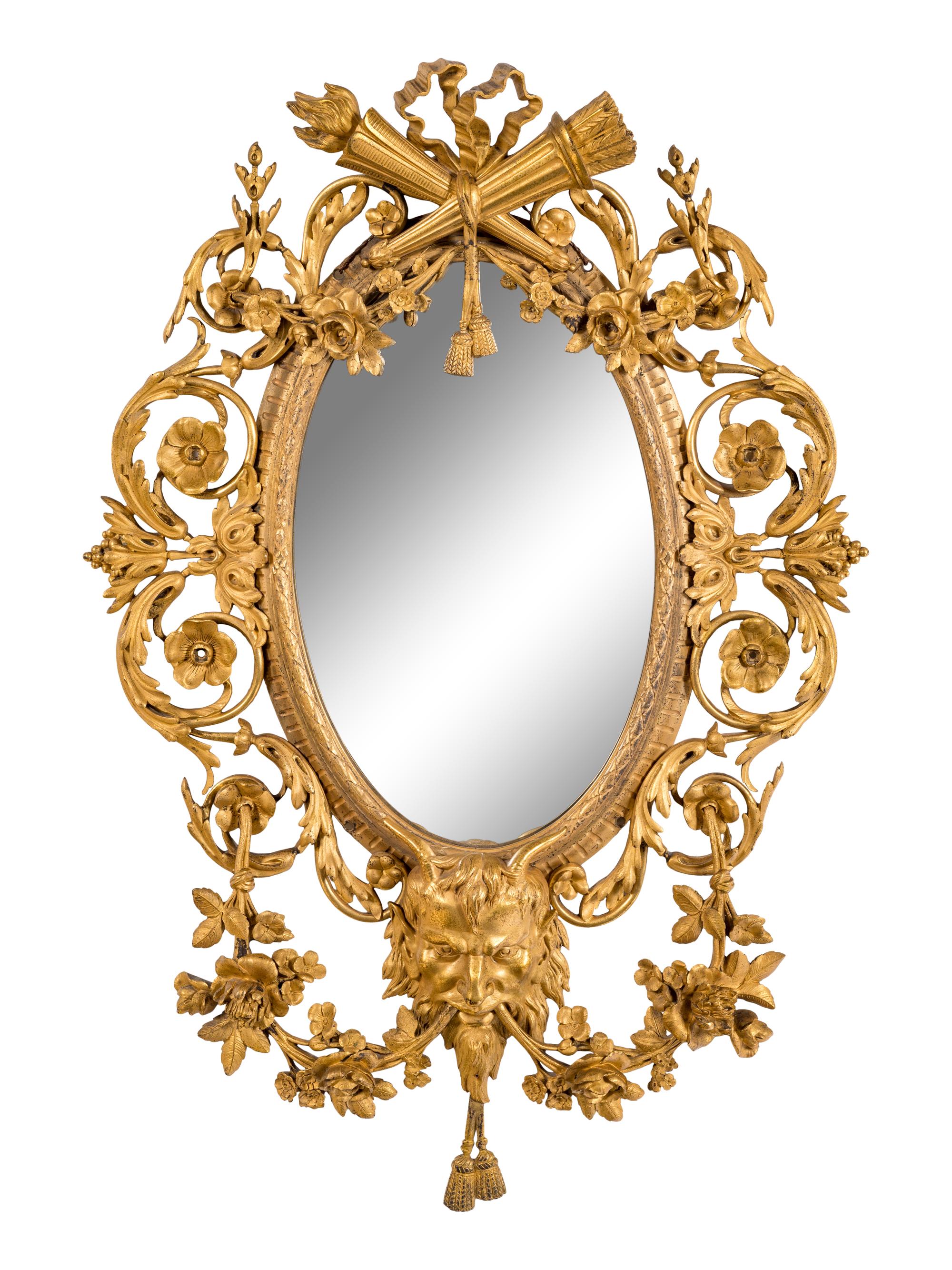 A French Gilt Bronze Mirror in the Manner of François Linke