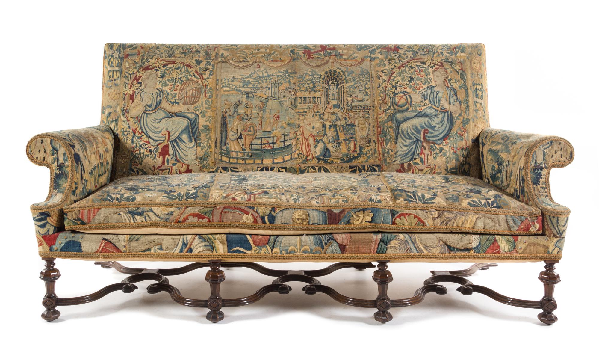 A Flemish Walnut Sofa Height 42 1/4 x width 84 1/2 x depth 33 inches. — LATE 19TH CENTURY