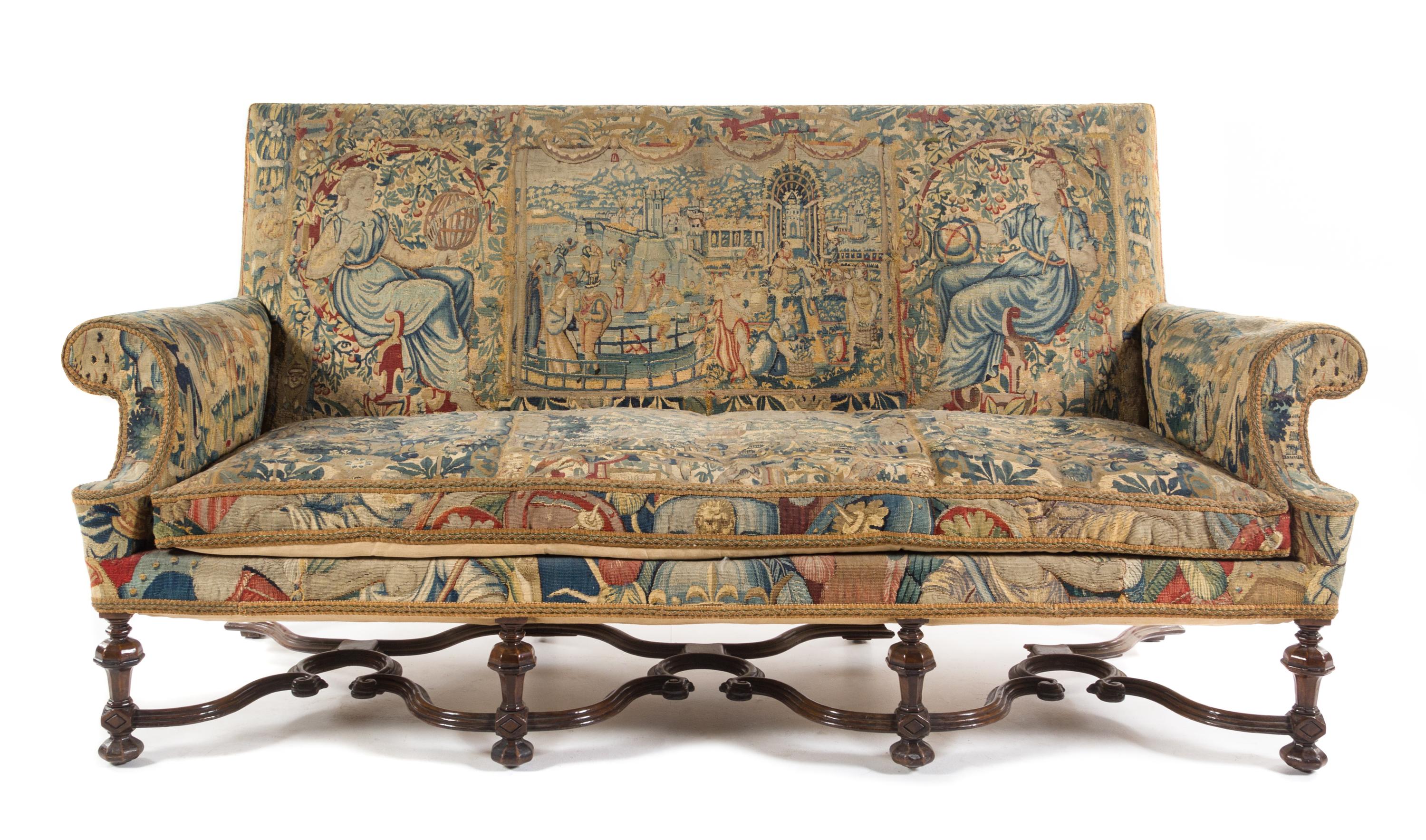 A Flemish Walnut Sofa Height 42 1/4 x width 84 1/2 x depth 33 inches. — LATE 19TH CENTURY
