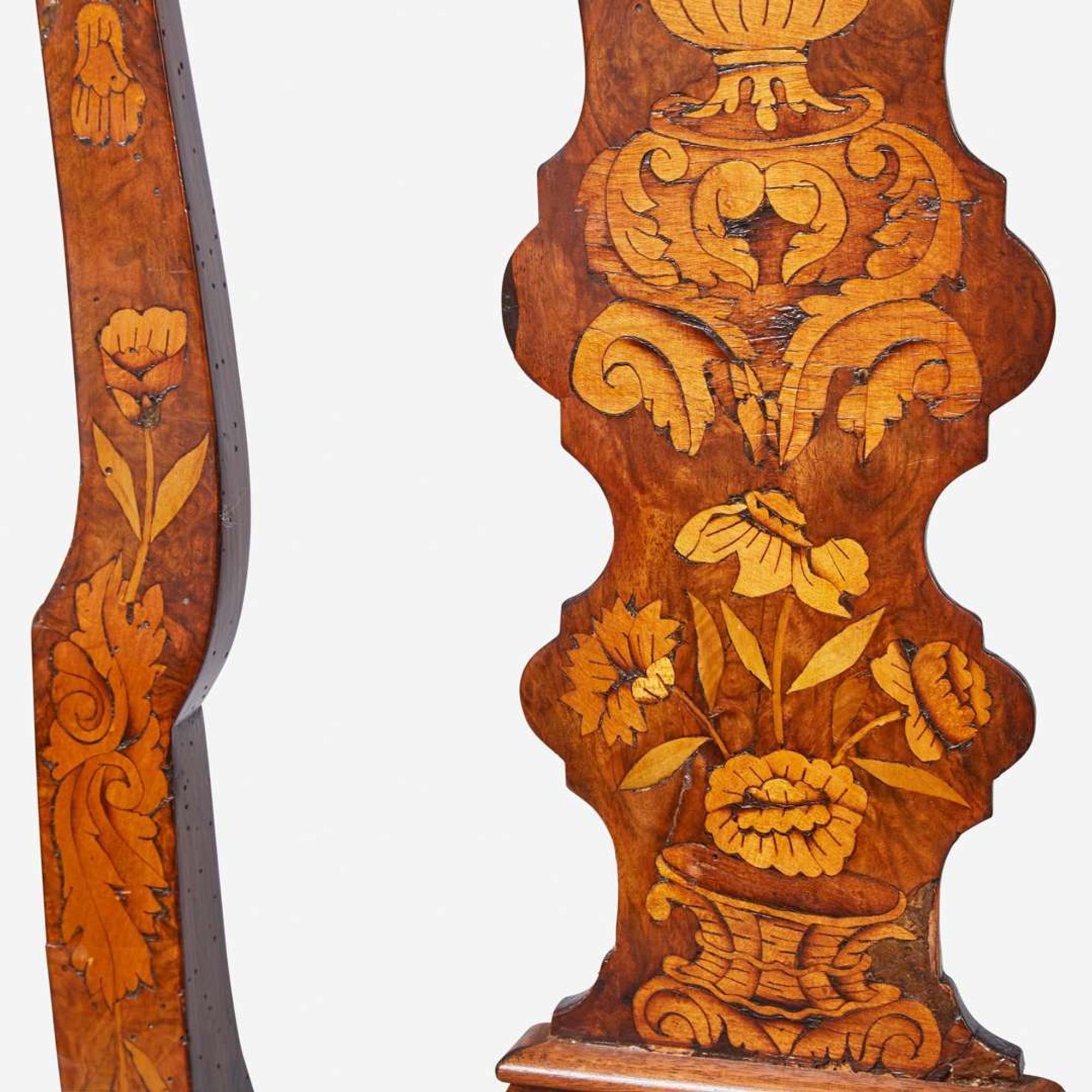 An assembled pair of Dutch Rococo inlaid walnut and marquetry side chairs circa 1750