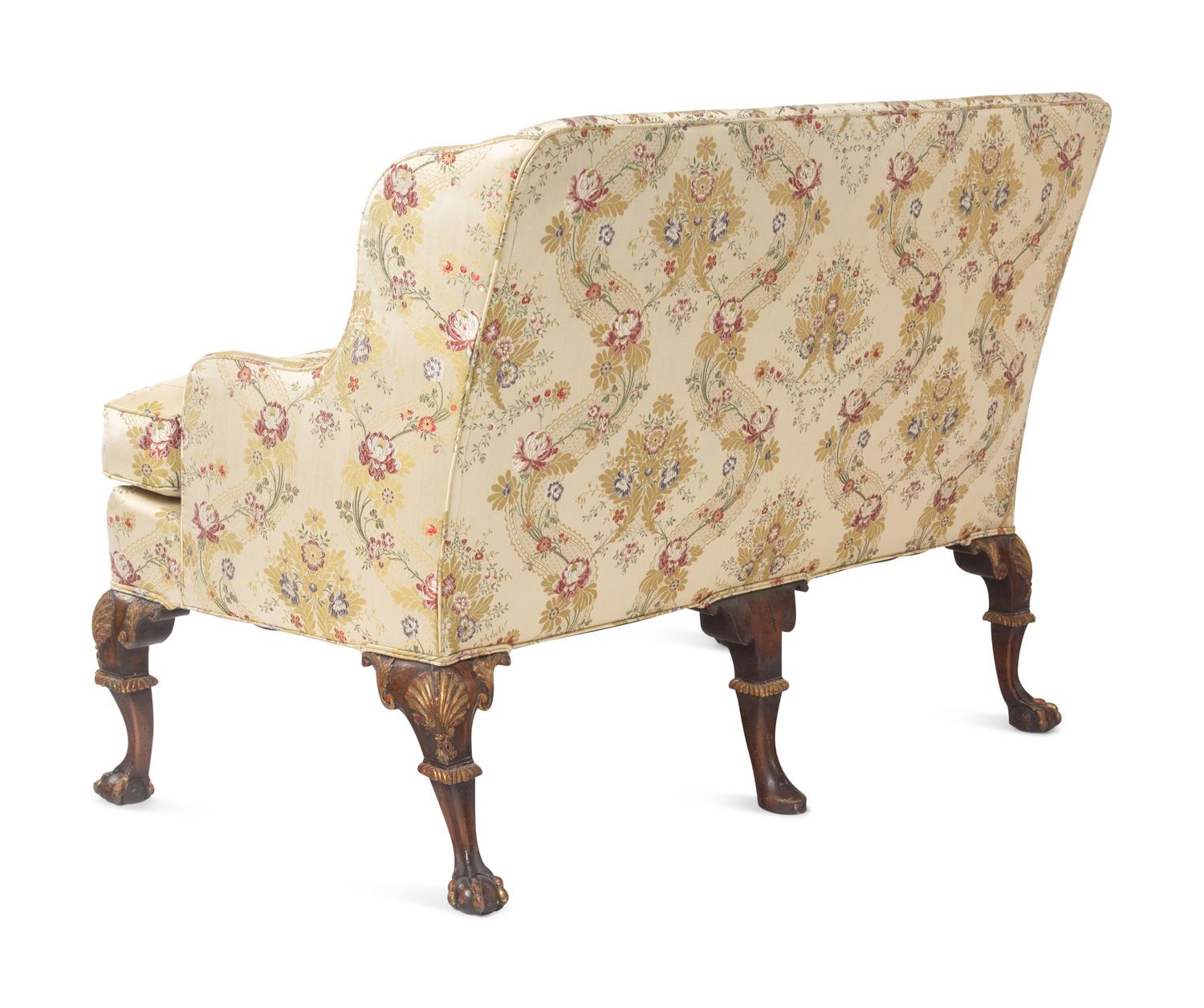A Pair of George II Style Parcel-Gilt Walnut Settees