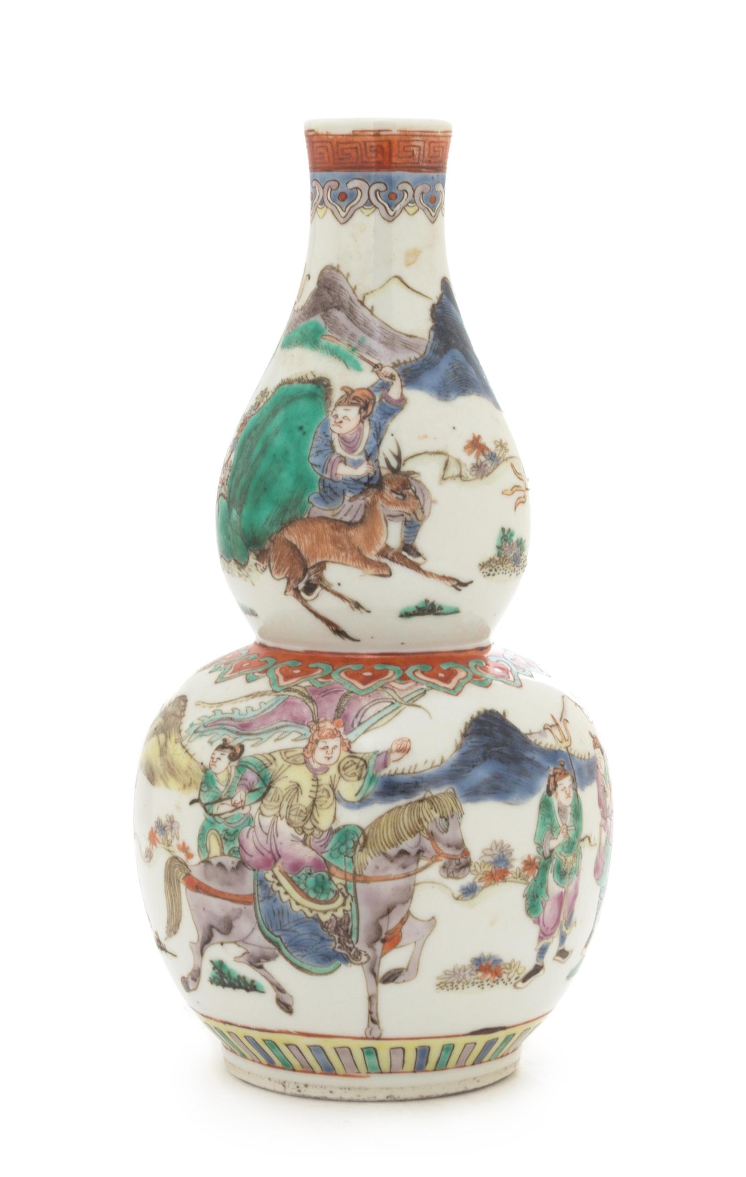 A Chinese Famille Rose Porcelain Gourd-Form Vase Height 9 inches.