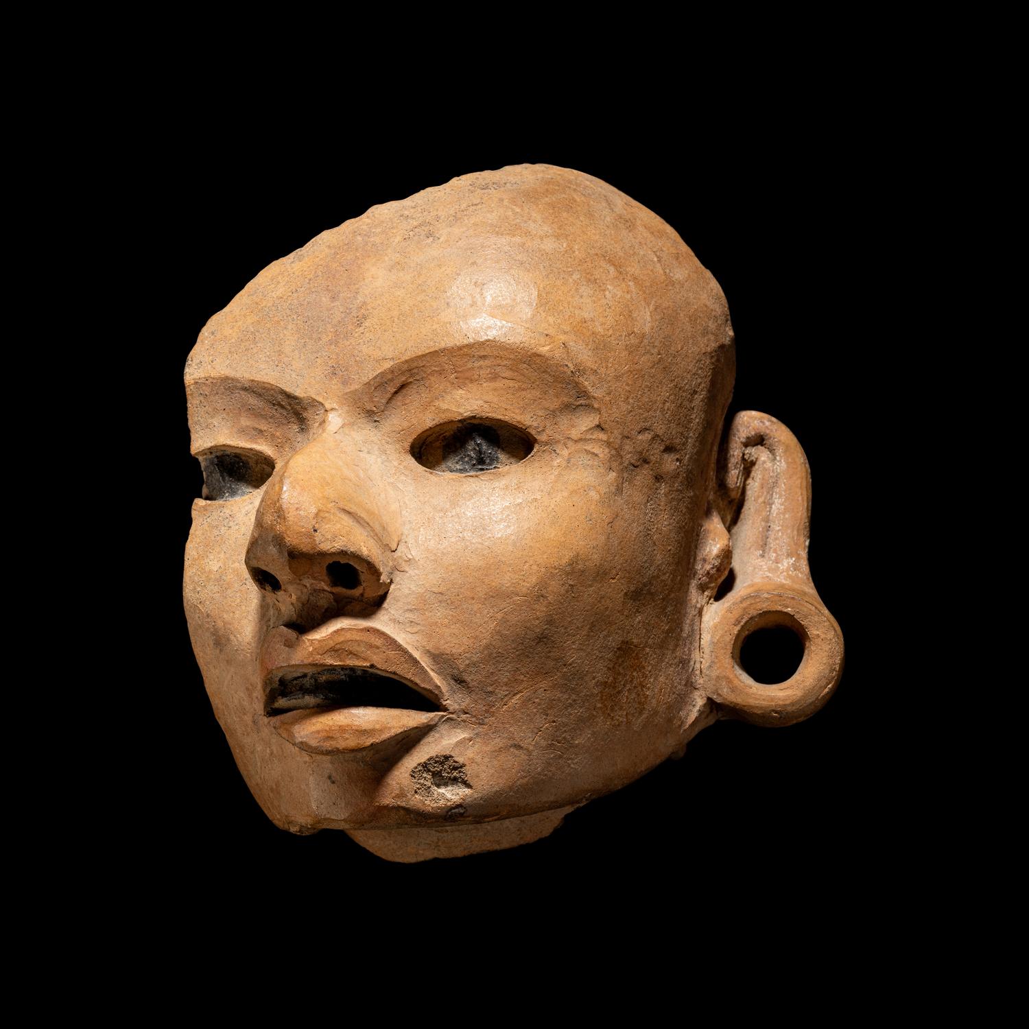 A Veracruz Terracotta Fragment of a Male Head