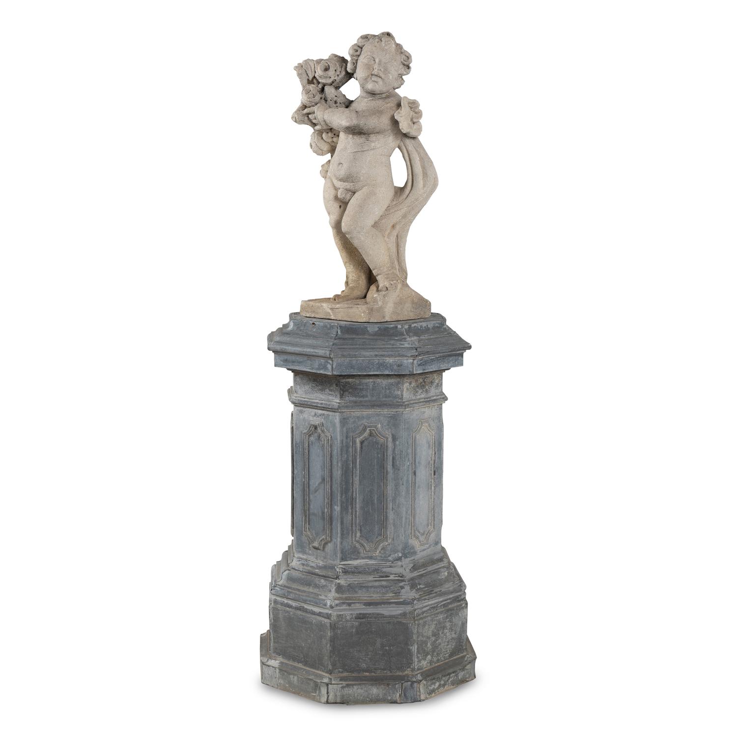 A Cast Stone Garden Figure of a Putto on a Zinc Pedestal
