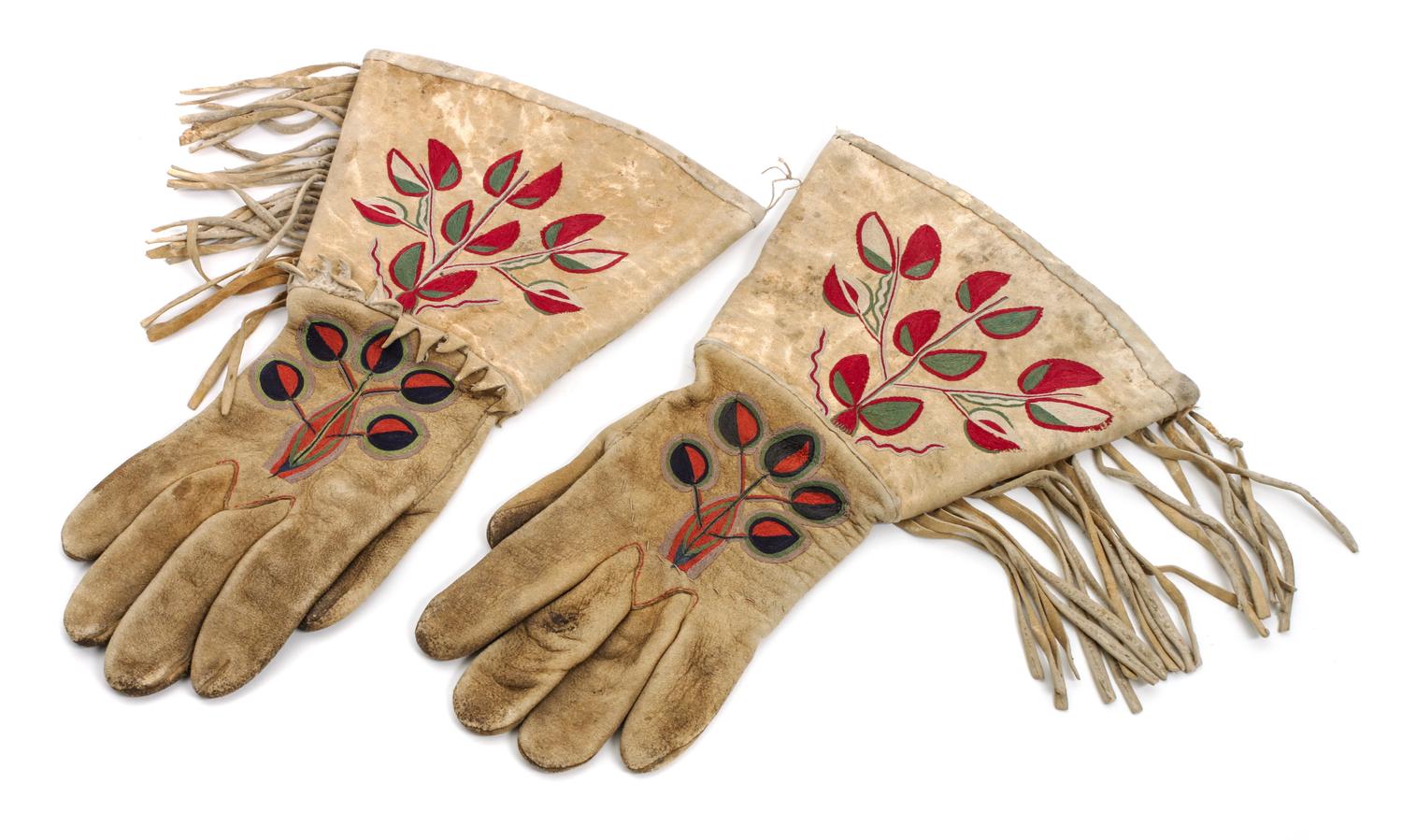 Two Pairs of Children's Chaps and a pair of Gauntlets Length of chaps 30 inches.