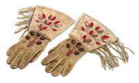 Two Pairs of Children's Chaps and a pair of Gauntlets Length of chaps 30 inches.