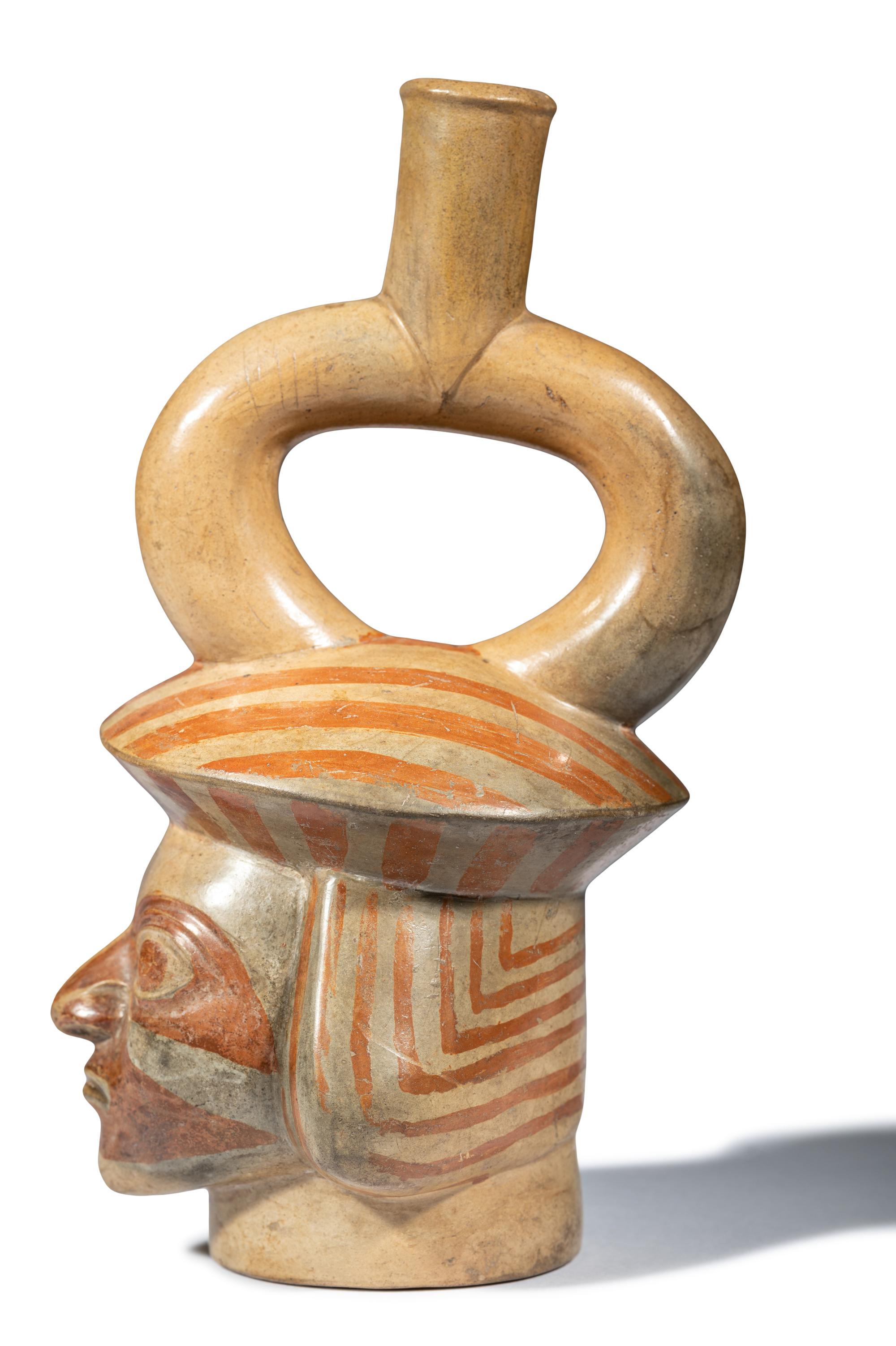 A Moche Portrait Head Vessel