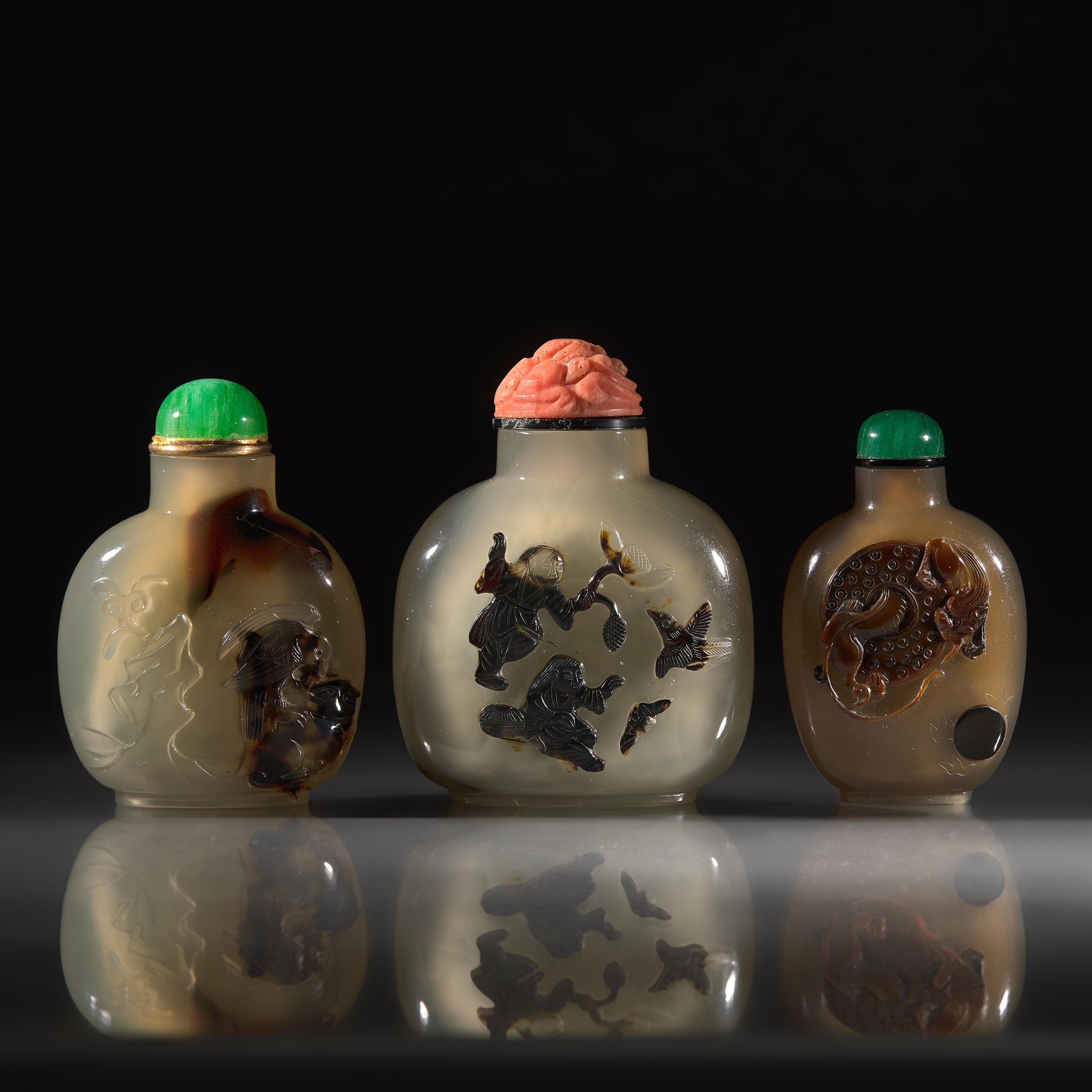 Three Chinese Carved "Shadow Agate" Snuff Bottles, 18th/19th Century and Later — 清中期及以後 瑪瑙巧雕鼻煙壺三支
