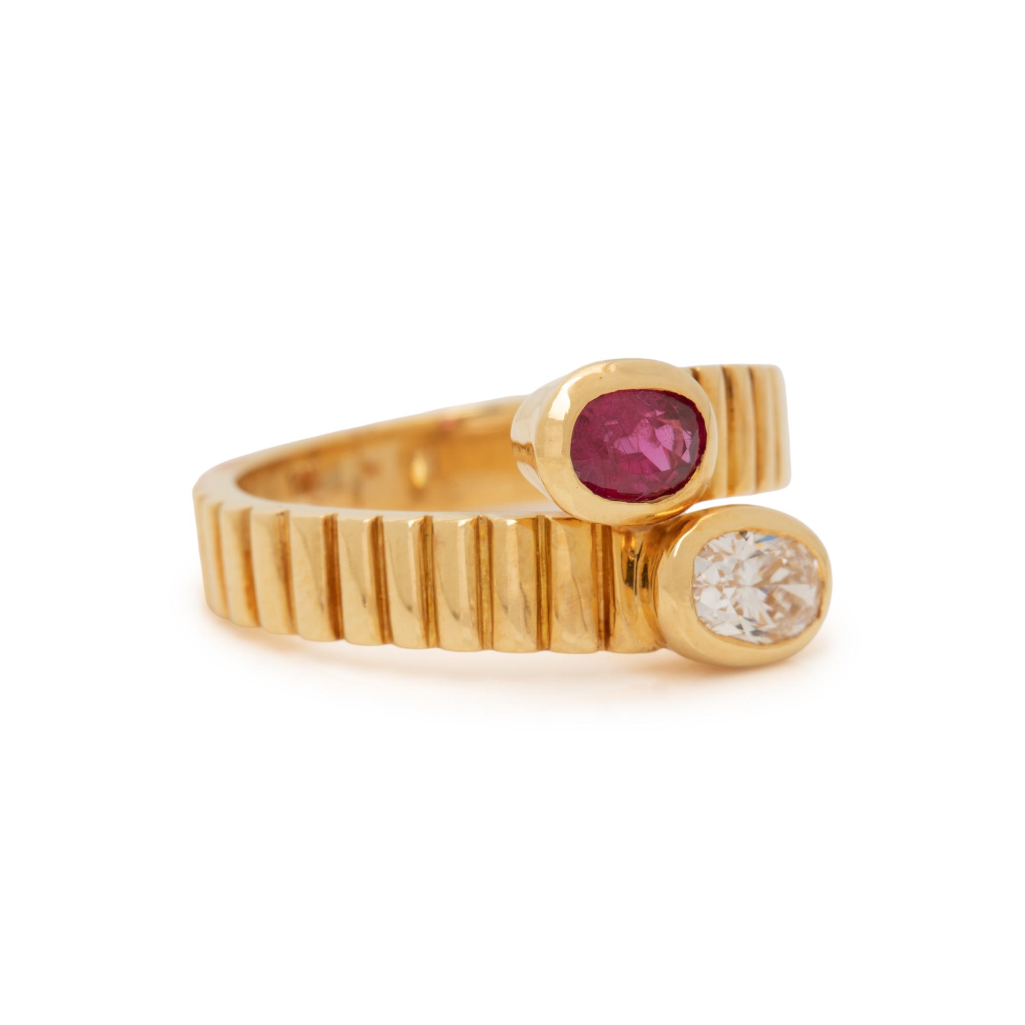 YELLOW GOLD, DIAMOND AND RUBY BYPASS RING