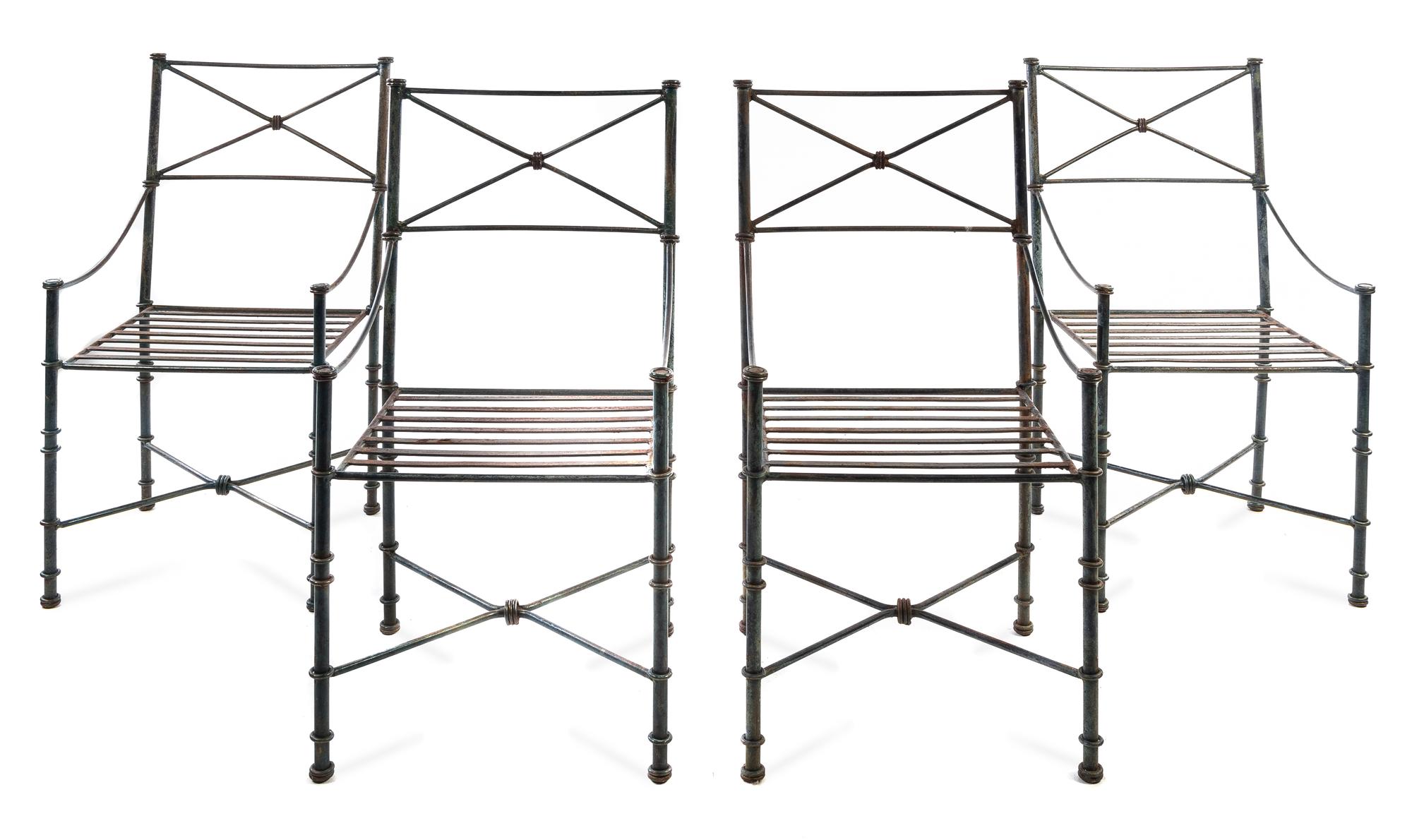 A Suite of Wrought Iron Patio Furniture Height of table 29 x width 36 x depth 36 inches. — 20TH CENTURY