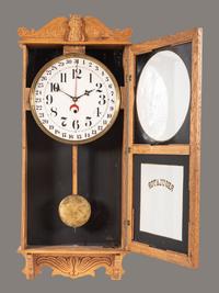 A Victorian Carved Oak Regulator Wall-Clock
