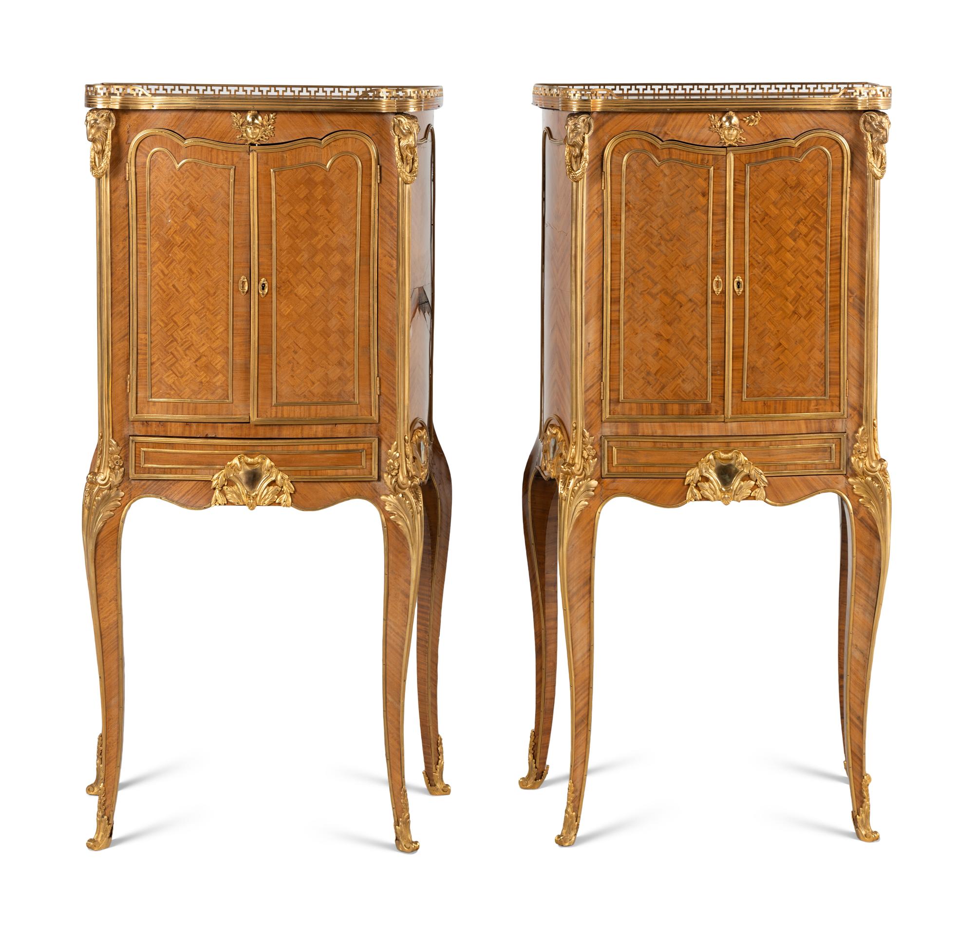 A Pair of Louis XV/XVI Transitional Style Gilt Bronze Mounted Parquetry Cabinets