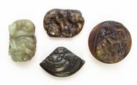 A Group of Four Hardstone Carvings Diameter of buckle 2 1/8 inches.