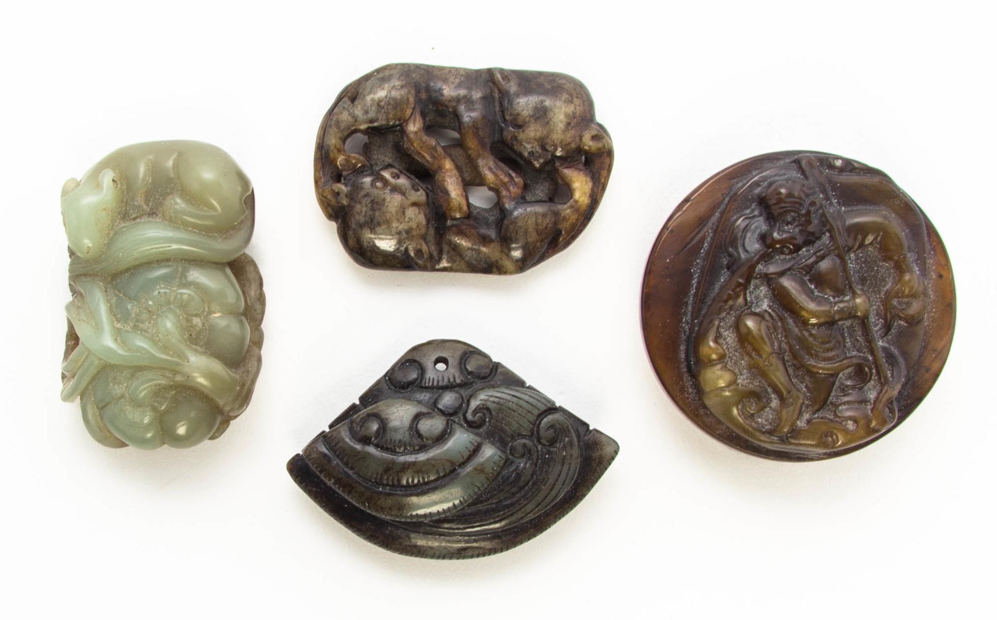 A Group of Four Hardstone Carvings Diameter of buckle 2 1/8 inches.