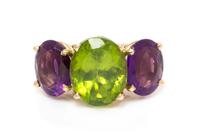 A 14 Karat Yellow Gold, Peridot and Amethyst Ring, 5.95 dwts.
