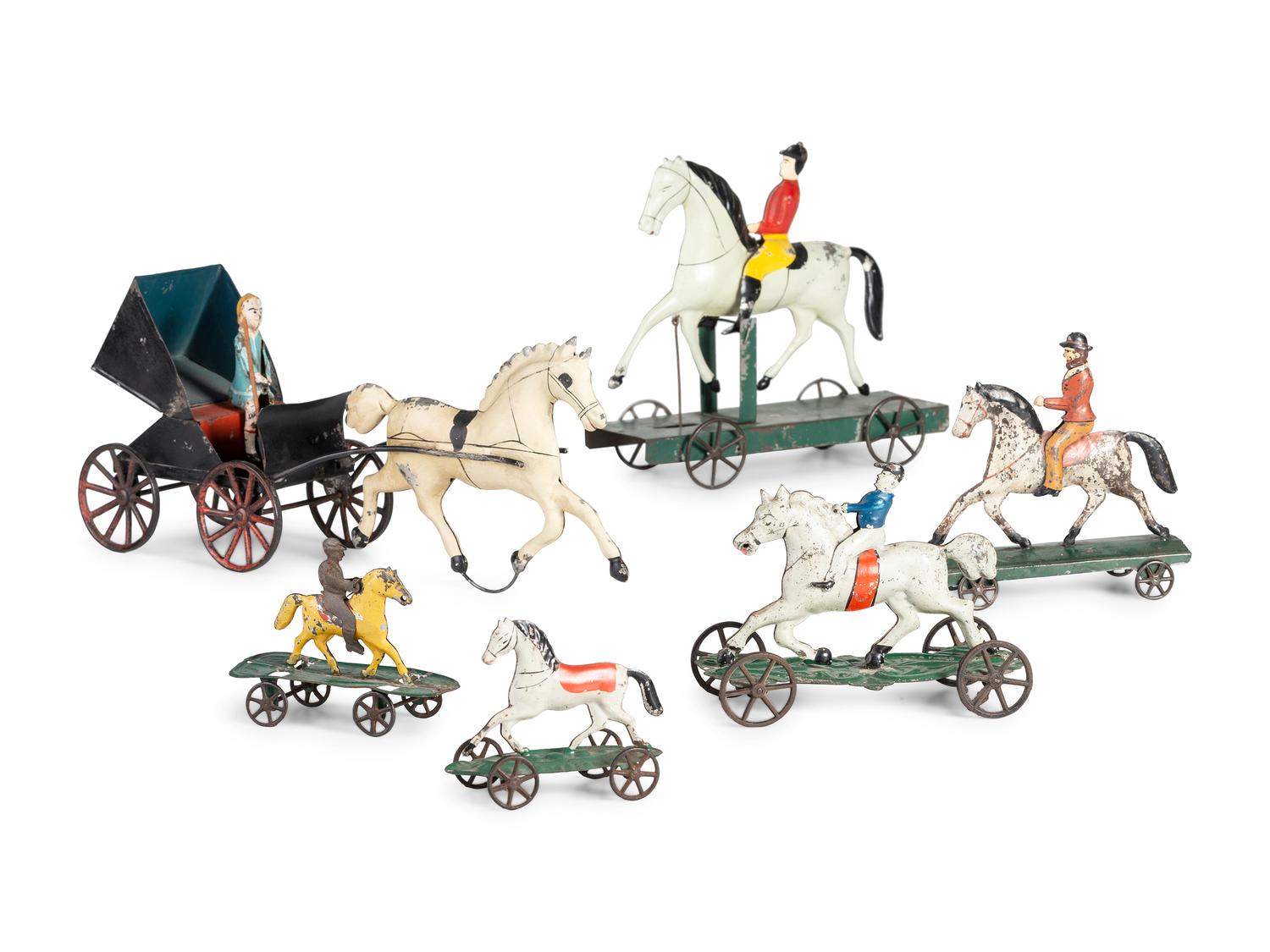 A Group of Six Pressed and Painted Tin Horse and Farm Animal Form Pull Toys
