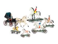 A Group of Six Pressed and Painted Tin Horse and Farm Animal Form Pull Toys