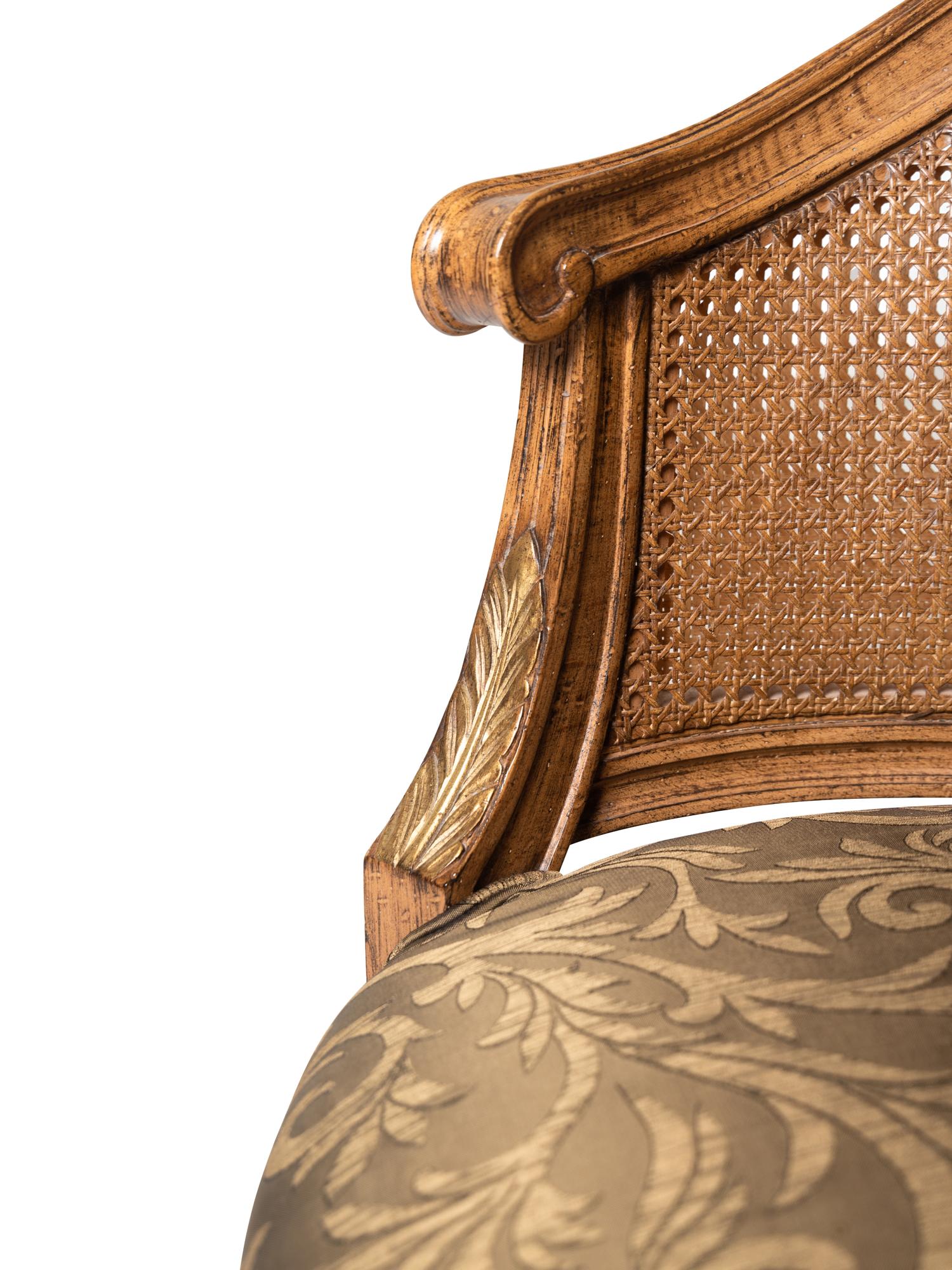A Pair of Louis XVI Style Caned Bergères