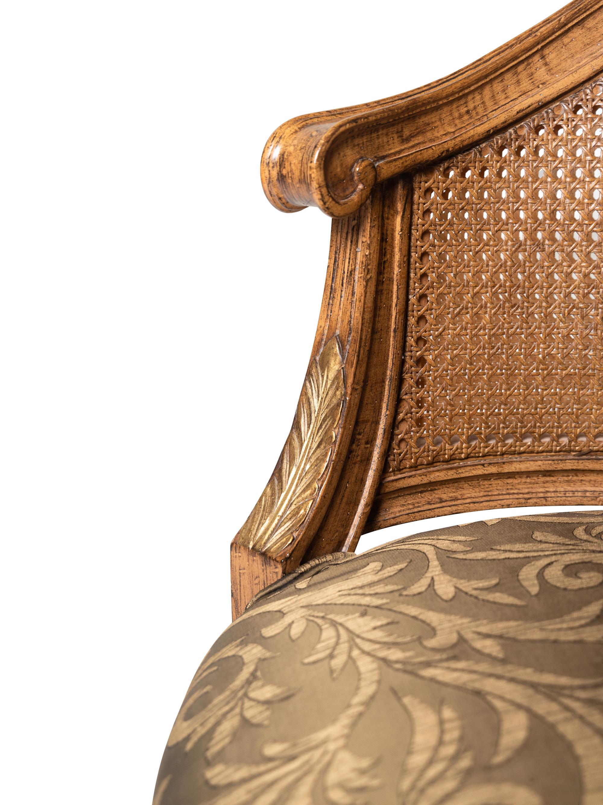 A Pair of Louis XVI Style Caned Bergères