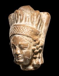 A Ghandaran Terracotta Head of a Woman