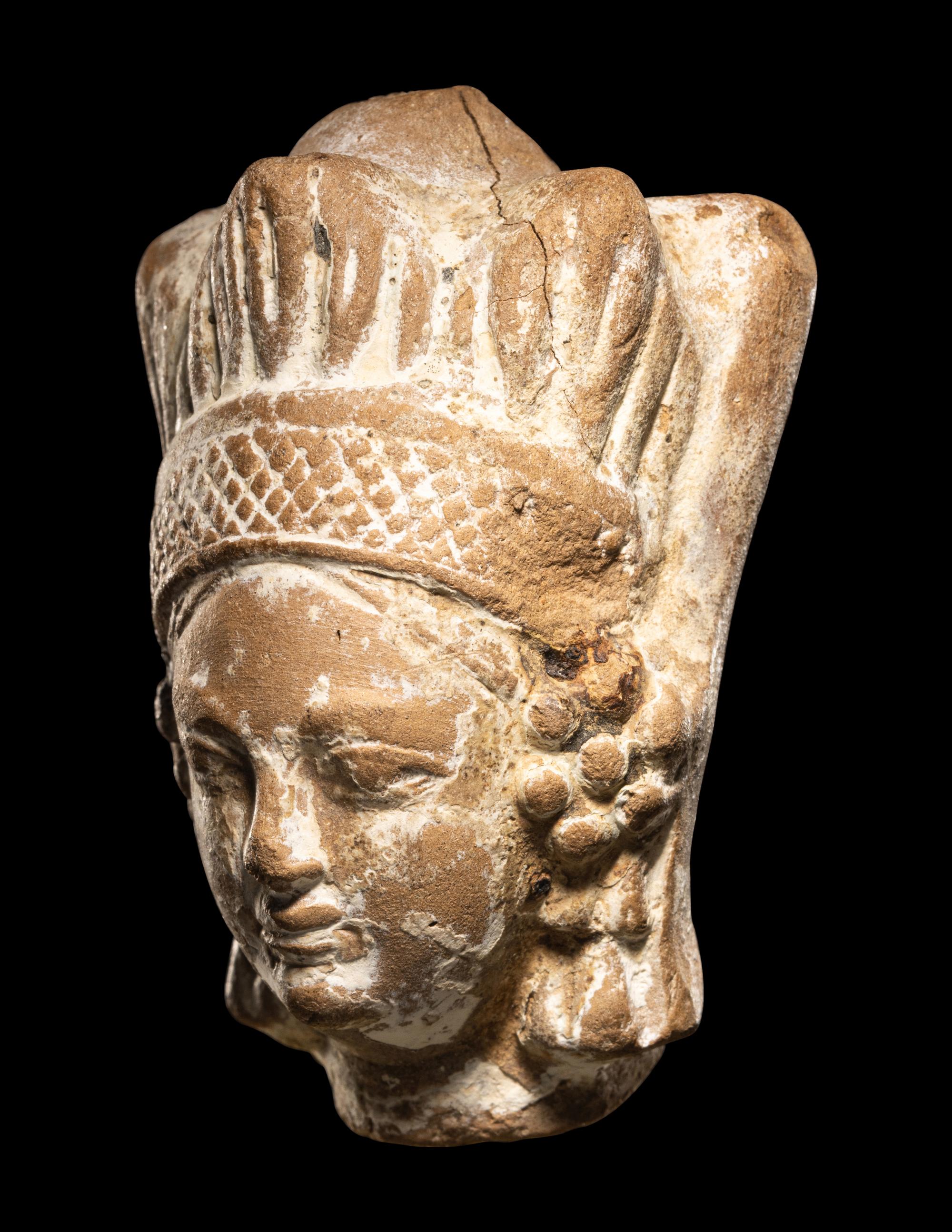 A Ghandaran Terracotta Head of a Woman