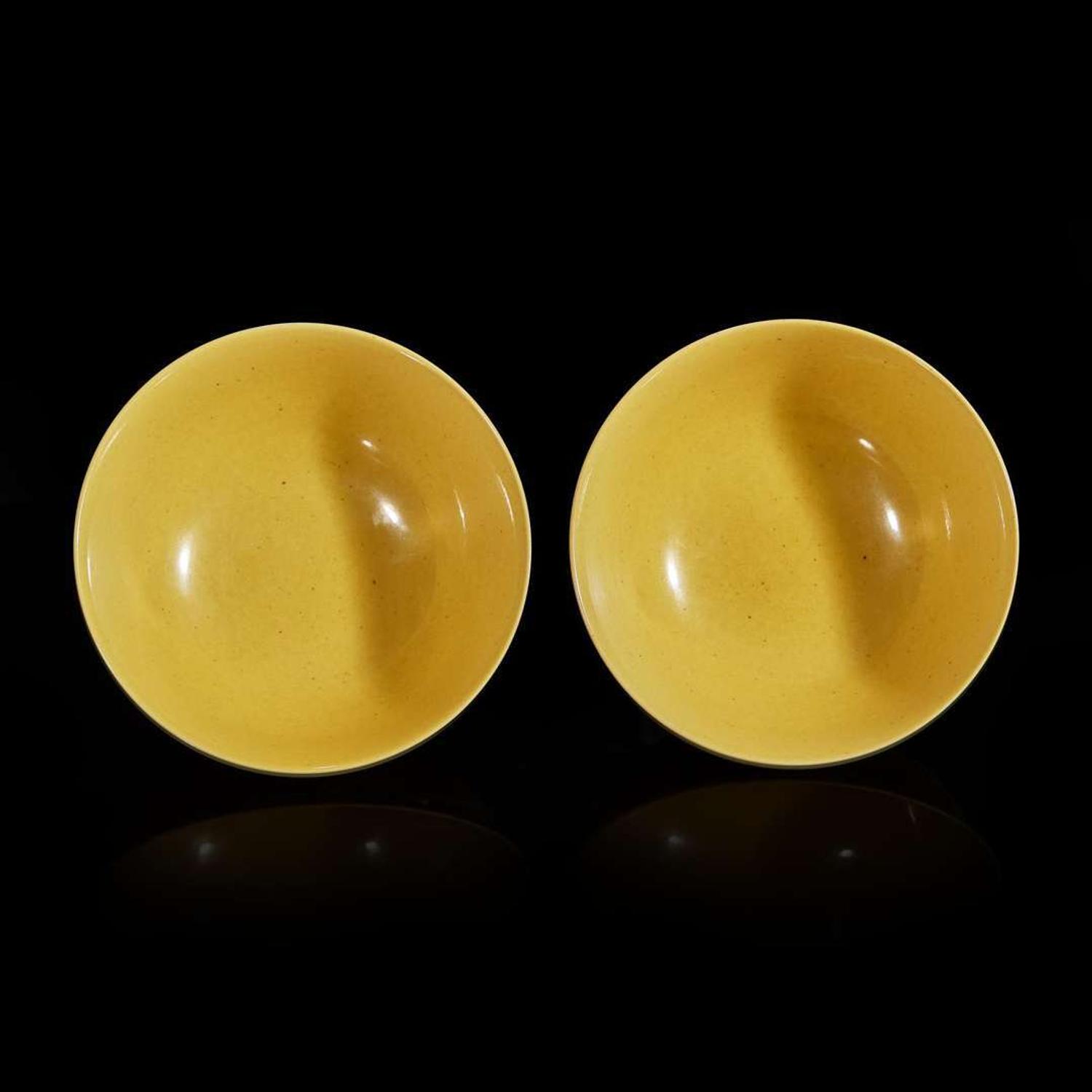 A pair of Chinese yellow-glazed porcelain bowls Daoguang six-character marks
