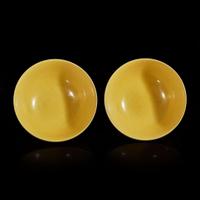 A pair of Chinese yellow-glazed porcelain bowls Daoguang six-character marks