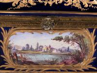 A Sèvres Style Gilt Metal Mounted, Painted and Parcel Gilt Porcelain Table Casket