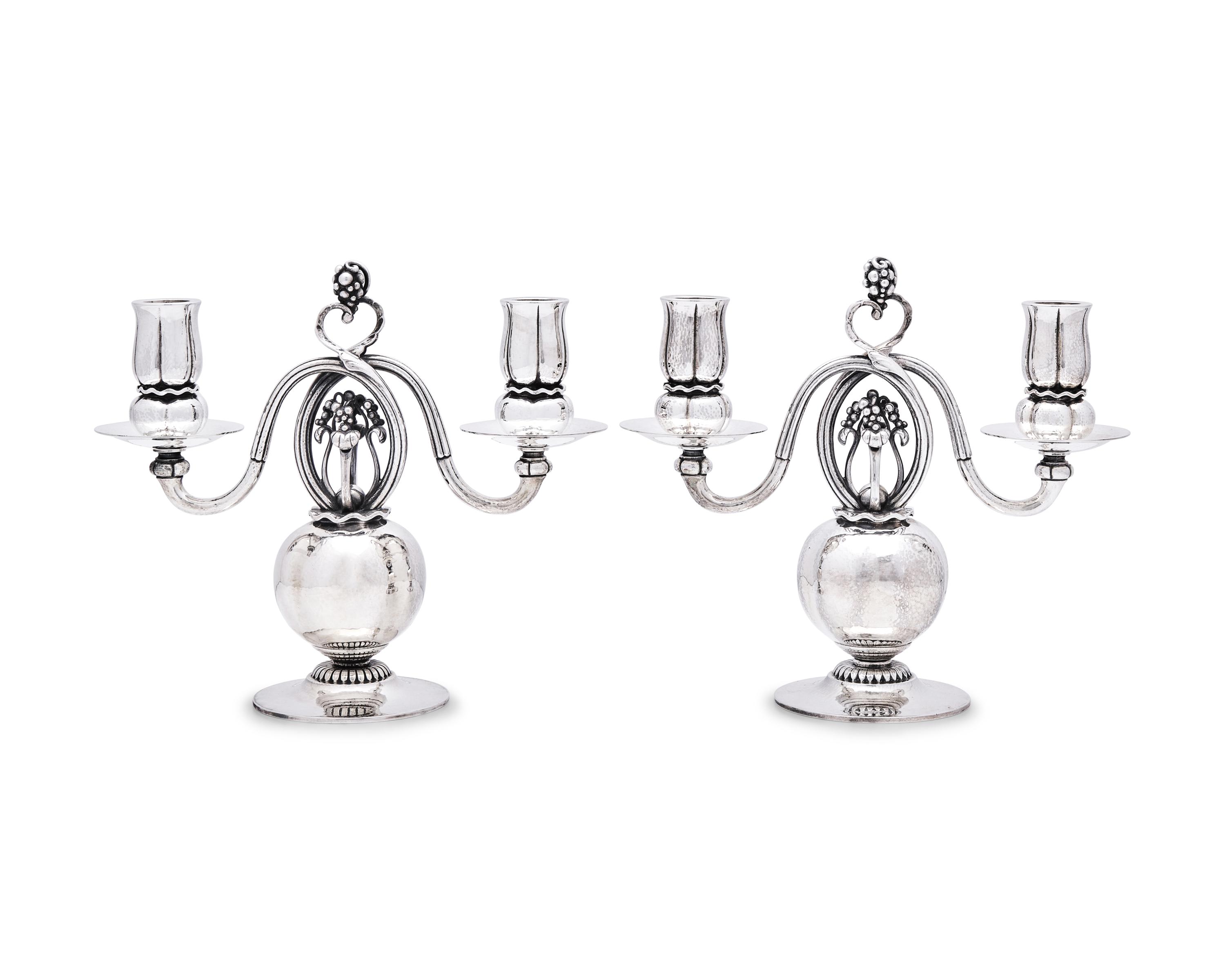 A Pair of Georg Jensen Silver Two-Light Candelabra