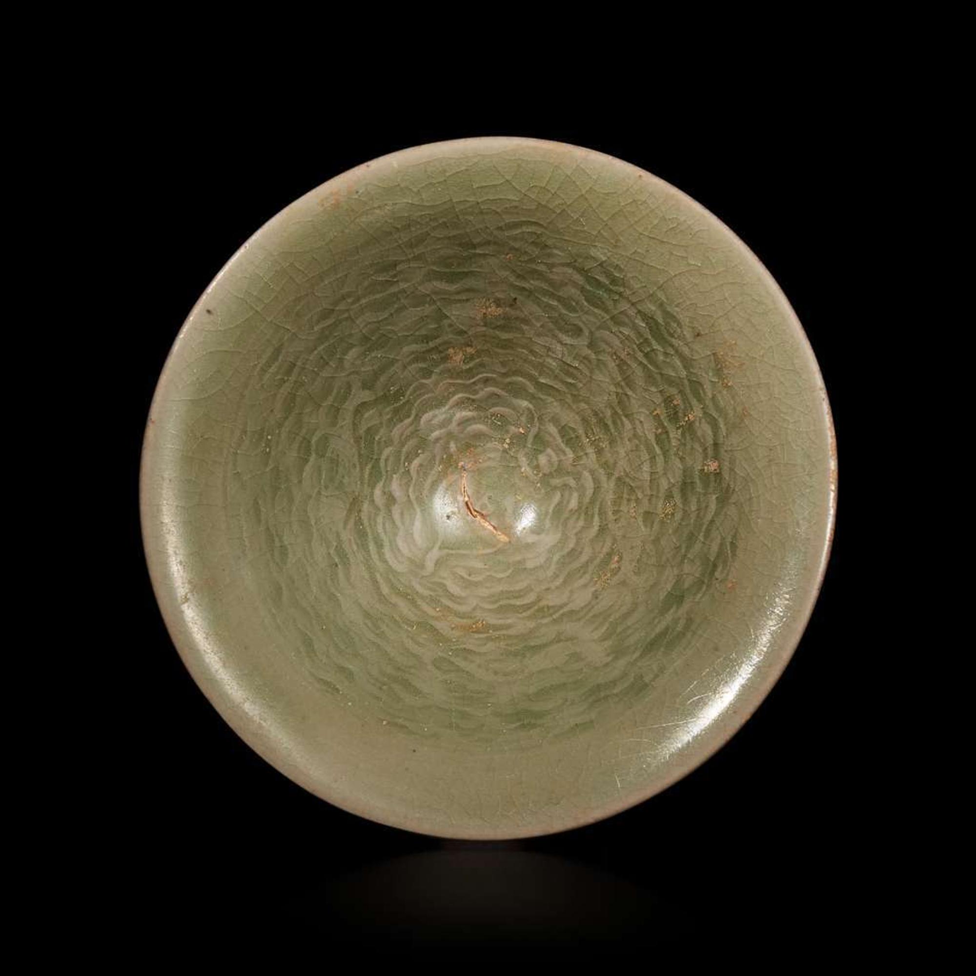 A small celadon-glazed molded conical bowl, Yaozhou 耀州窯斗笠盞 Possibly Song dynasty ????