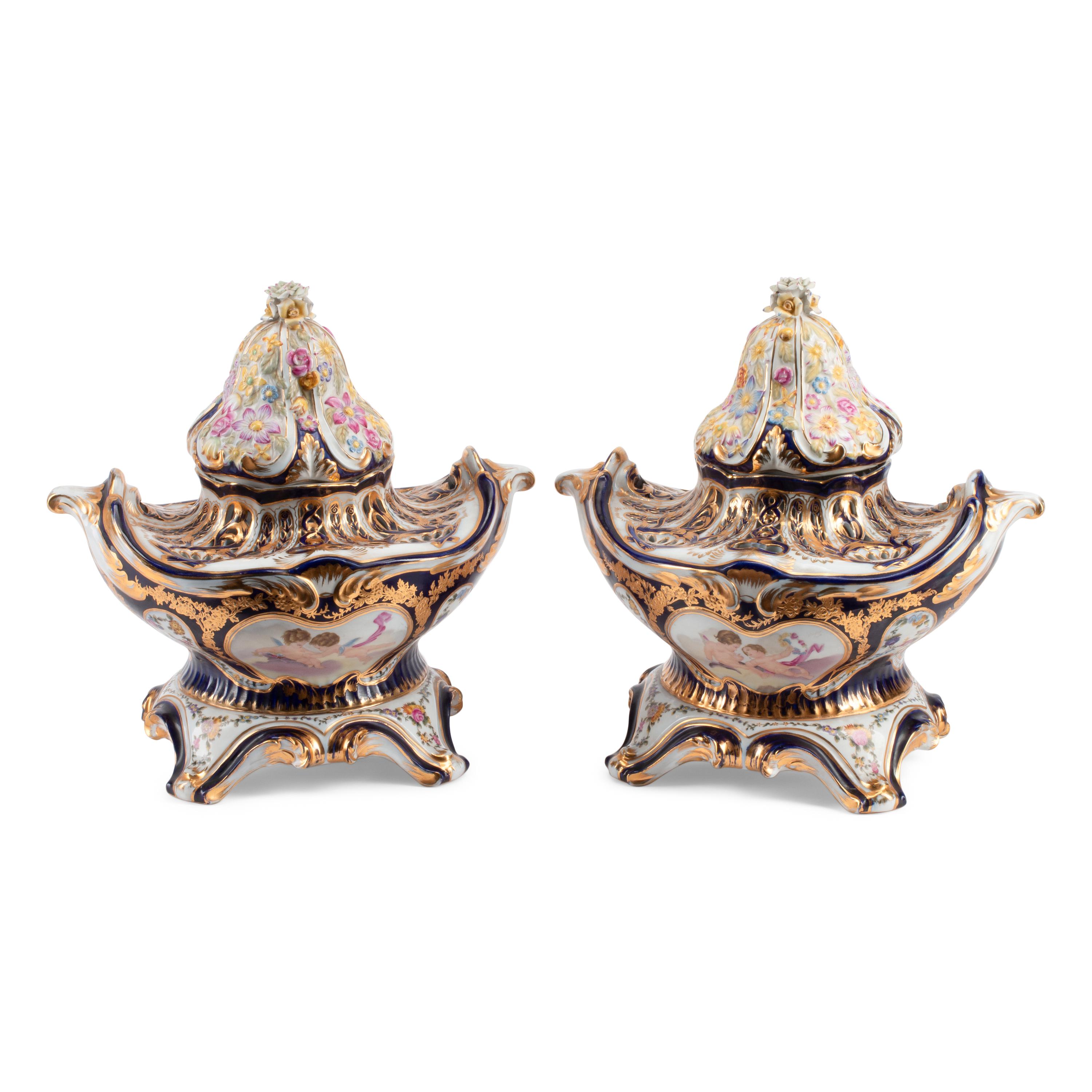 A Pair of Sèvres Style Porcelain Potpourri Vases and Covers