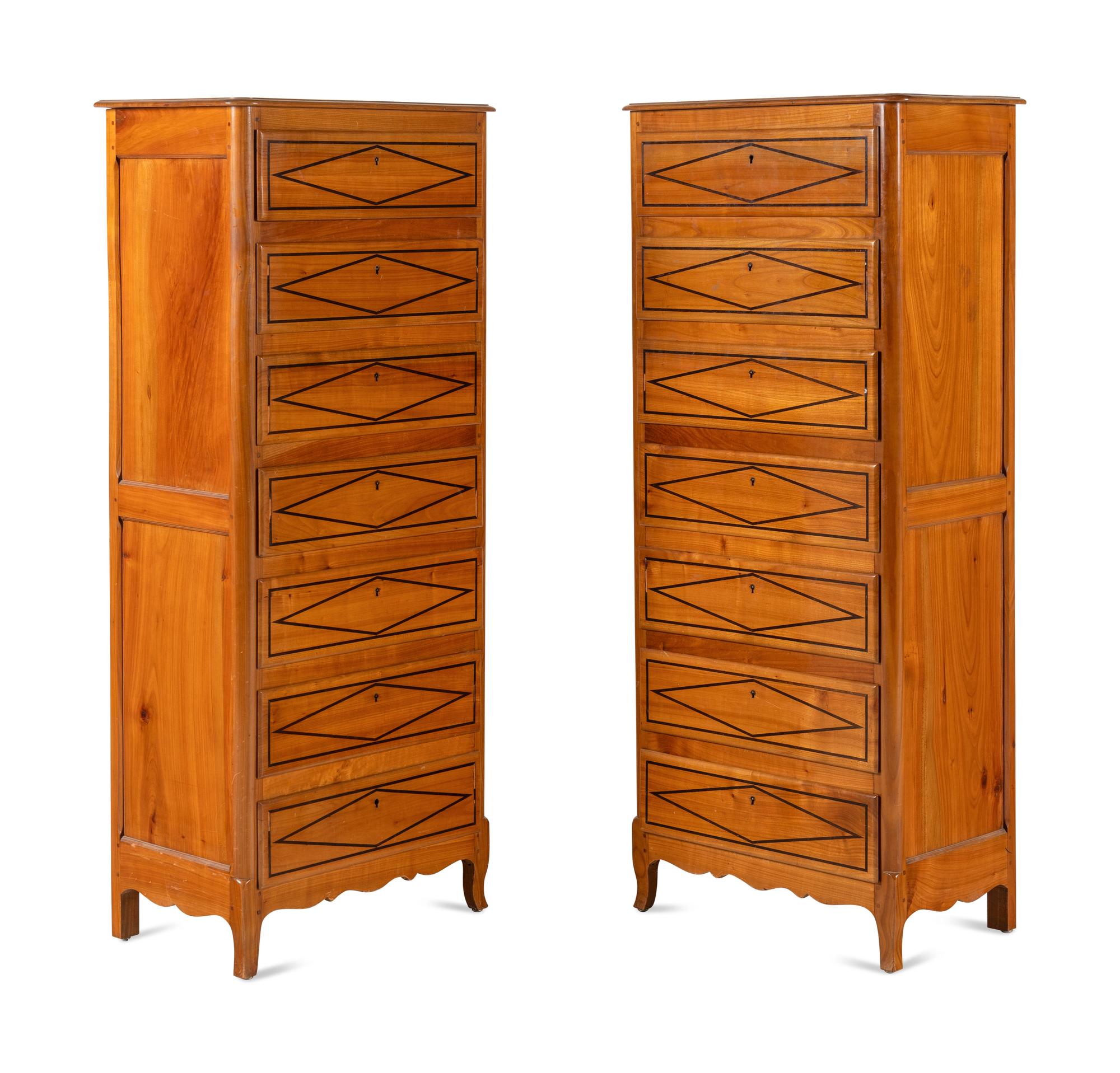 A Pair of French Fruitwood and Parcel-Ebonized Semaniers