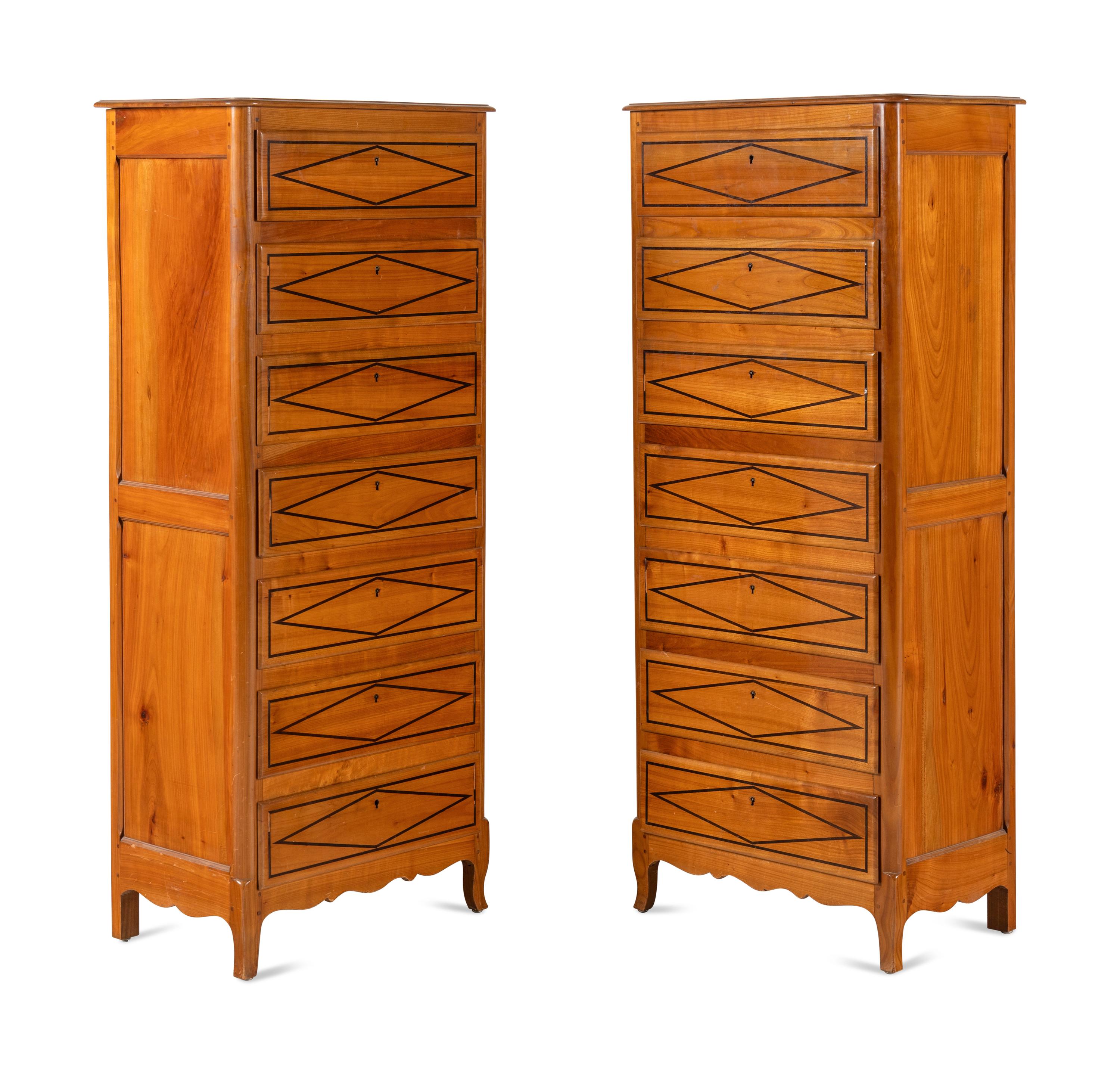 A Pair of French Fruitwood and Parcel-Ebonized Semaniers