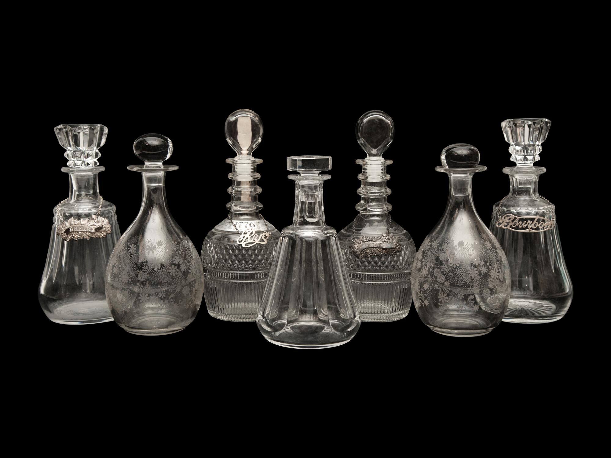A Group of Seven Decanters by Baccarat and Tiffany & Co. — Early 20th Century