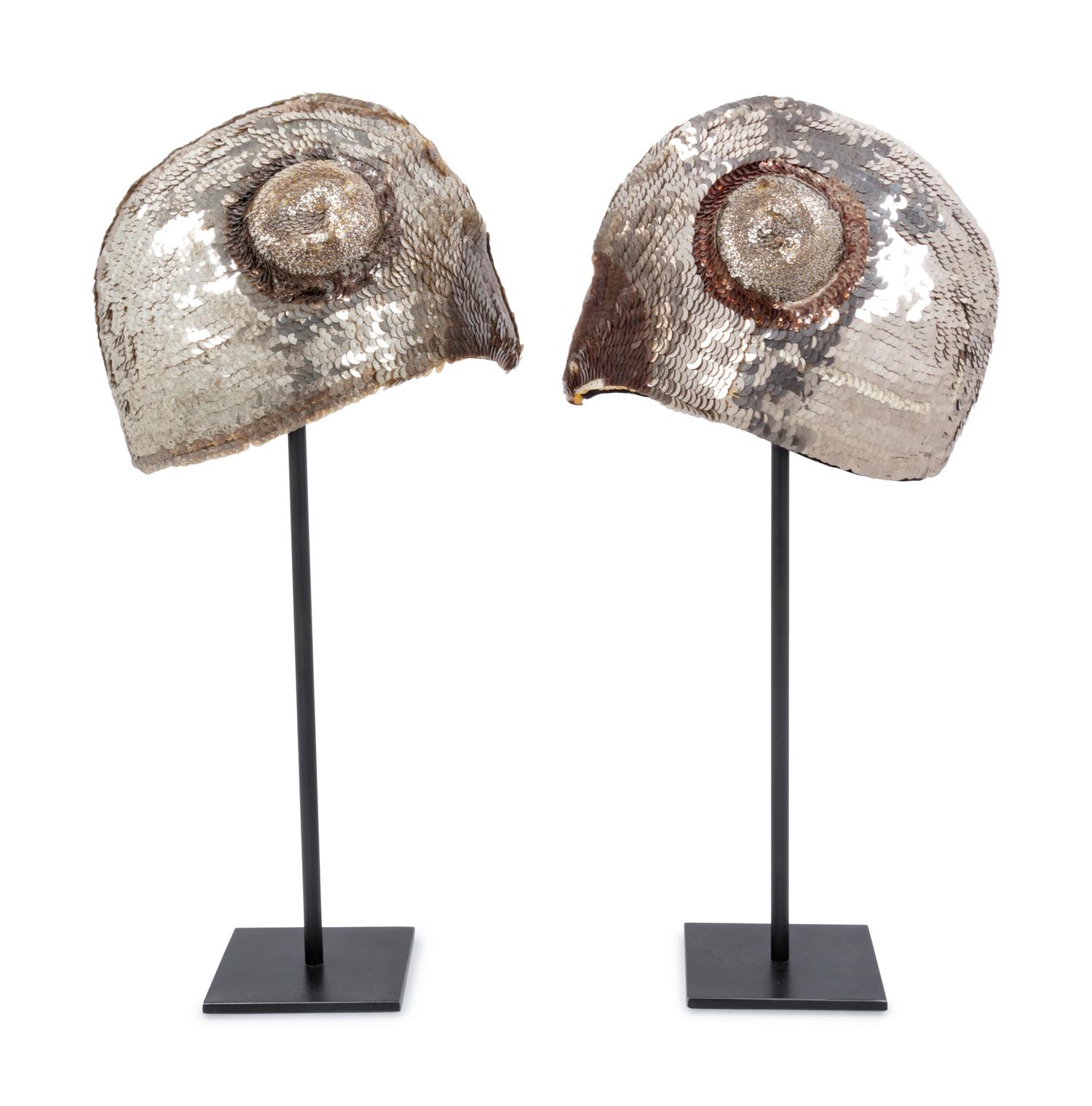 A Pair of Southeast Asian Headdresses on Stands